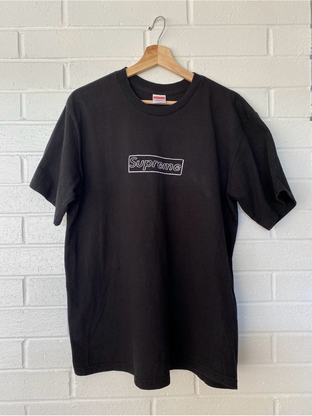 Supreme Black T-Shirt with White Outlined Logo